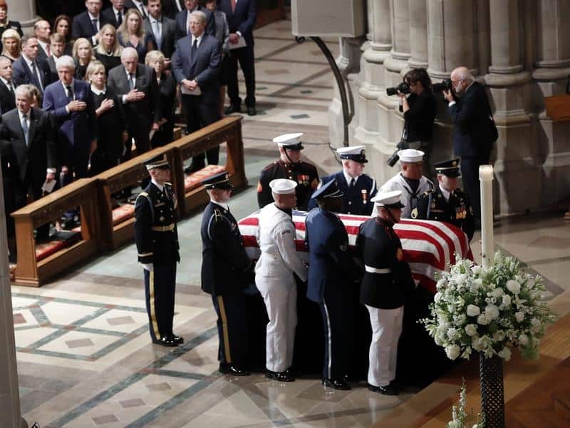 Former presidents and other top power players in US politics have gathered to mourn John McCain.