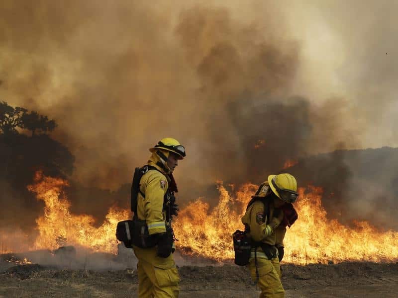 Firefighters continue to battle huge blazes in Lakeport, California, with thousands evacuated. 