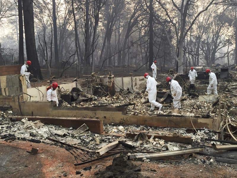 Search teams combing through burned-out areas, looking for human remains in California.