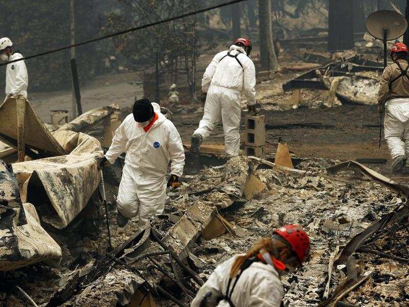 Heavy rains will hamper the search for remains but aid firefighters battling California's wildfires. 