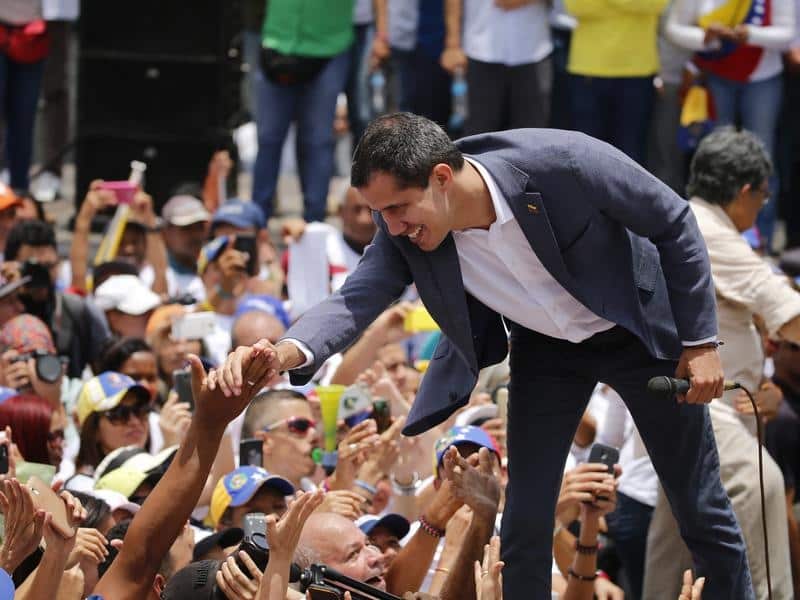 Juan Guaido greets supporters in Caracas.