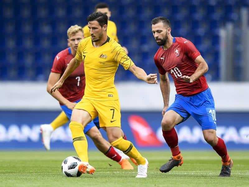 Mathew Leckie (C) of Australia in action against the Czech Republic.