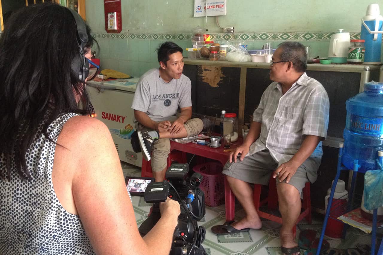 Joe and his dad, Nguyen Tu Hoang Tuan, smoke cigars and catch up on the years they've missed.