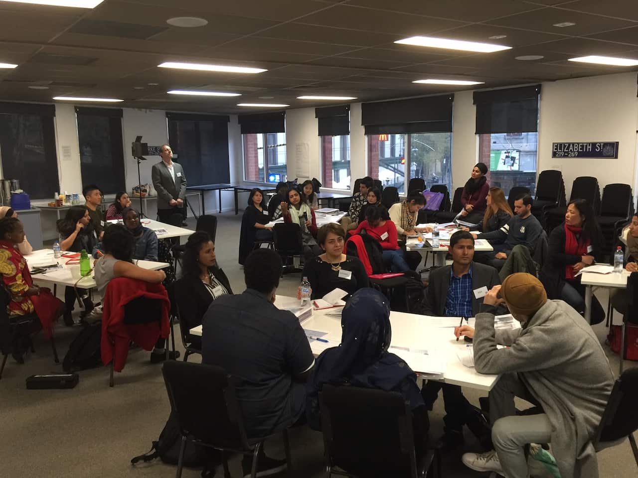 AMES migrant refugee settlement services hub