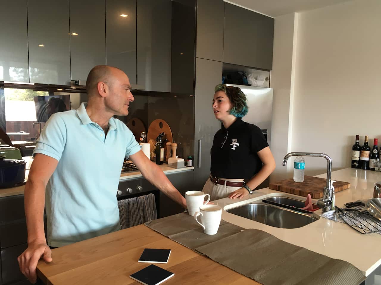 Aspiring journalist Alex Giannakis has reached the final 3 in a competition to become a globe-trotting football reporter and presenter. (SBS)