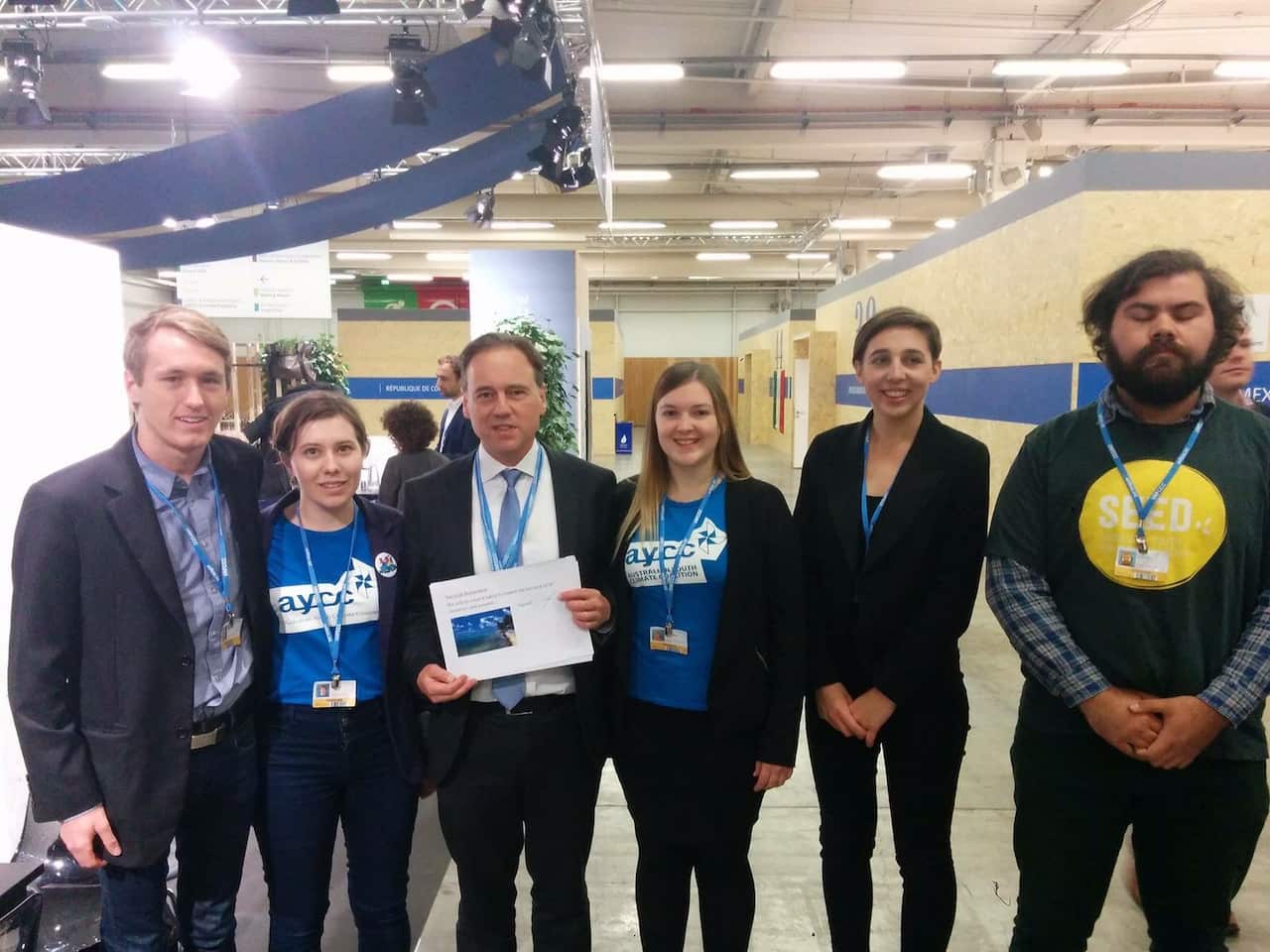 Environment Minister Greg Hunt with Australian Youth Climate Coalition members after signing their pledge (Photo: Sarah Abo)