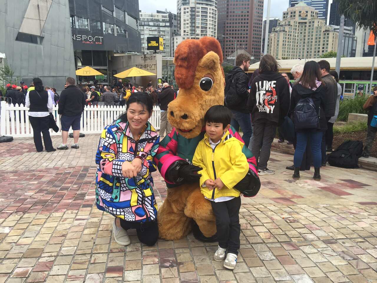 Melbourne Cup visitors pose with horse