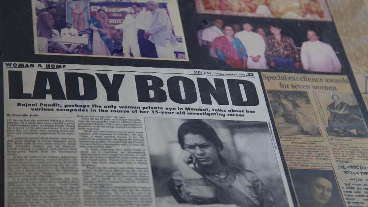 Rajani's scrapbook of cuttings shows one of her nicknames, Lady Bond.