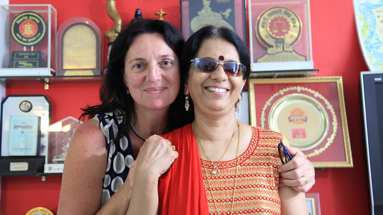 Catherine and Rajani at her office in Mumbai.