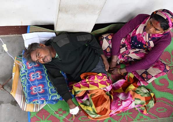 An Indian patient who drank toxic bootleg liquor is treated at Kushal Konwar Civil Hospital in Golaghat district in the northeastern Indian state of Assam.