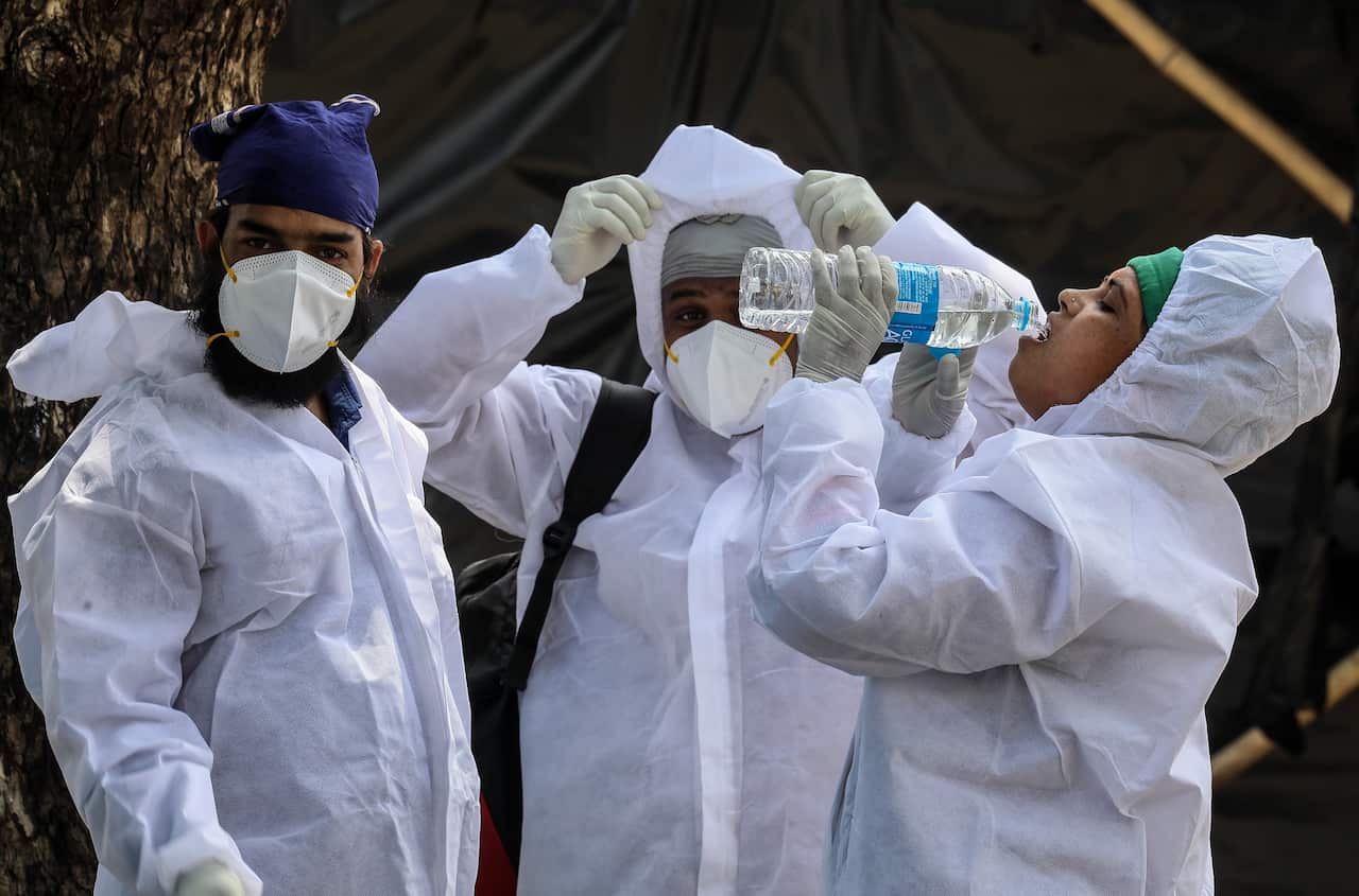 Health workers at a COVID-19 centre in Mumbai, India on 24 May 2021.  