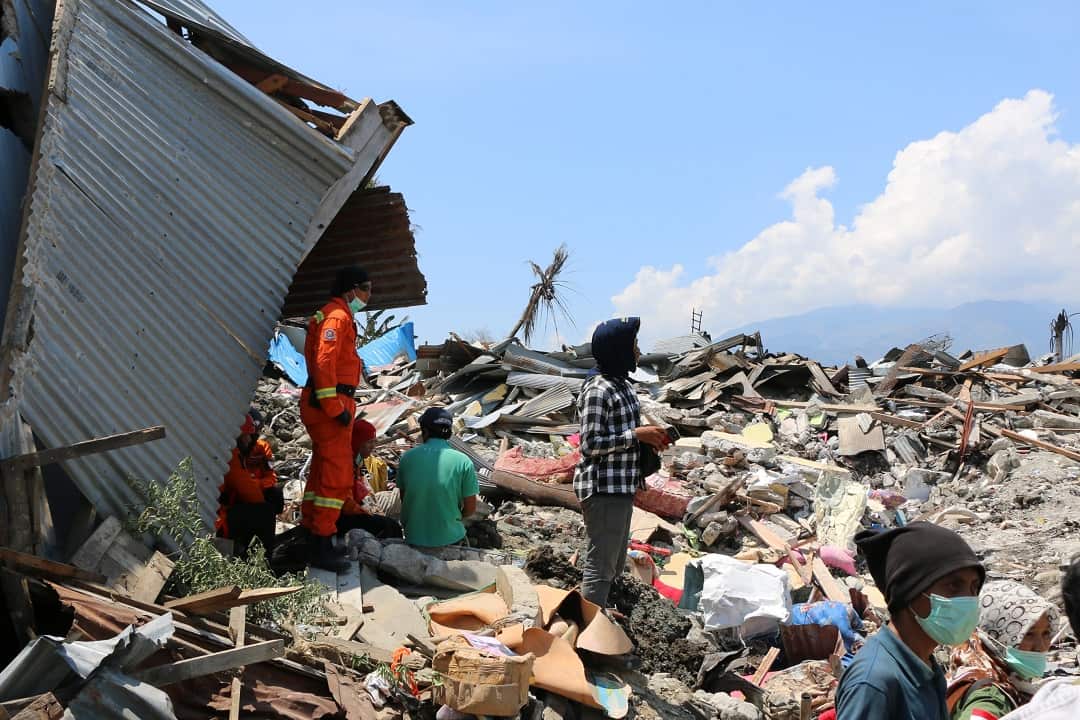 Rescue teams continue searching for victims as the death toll tops 1200.