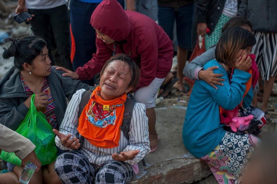 The death toll in Indonesia's twin quake-tsunami disaster has passed 1,400. 