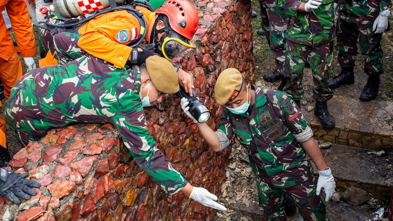 Members of rescue team at work in Banten, Indonesia, on December 24, 2018.