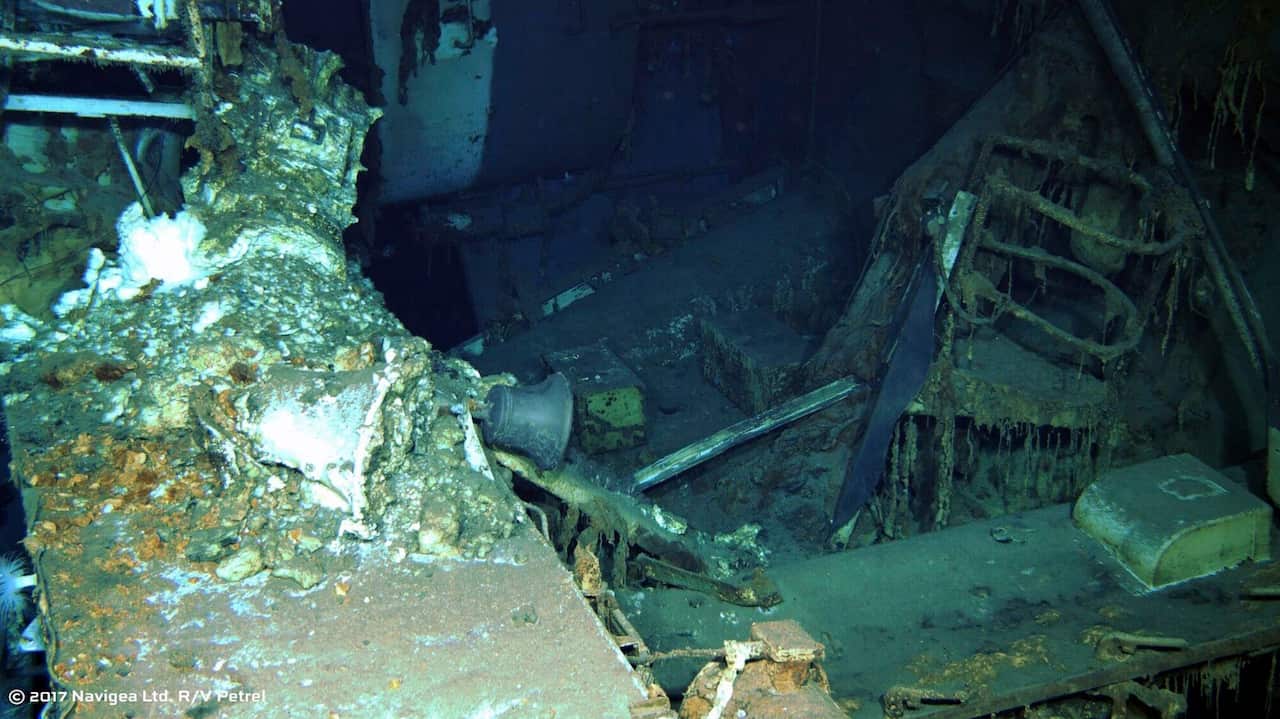 The wreckage of the USS Indianapolis, including the ship's bell at the bottom of the North Pacific Ocean (AAP)