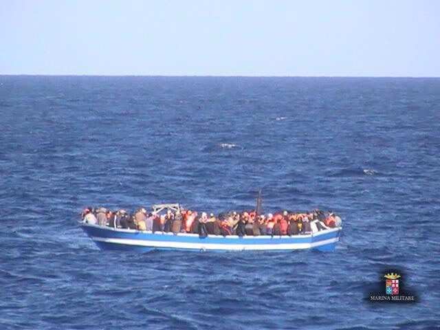italy_migrants_small_boat_241214_aap.jpg