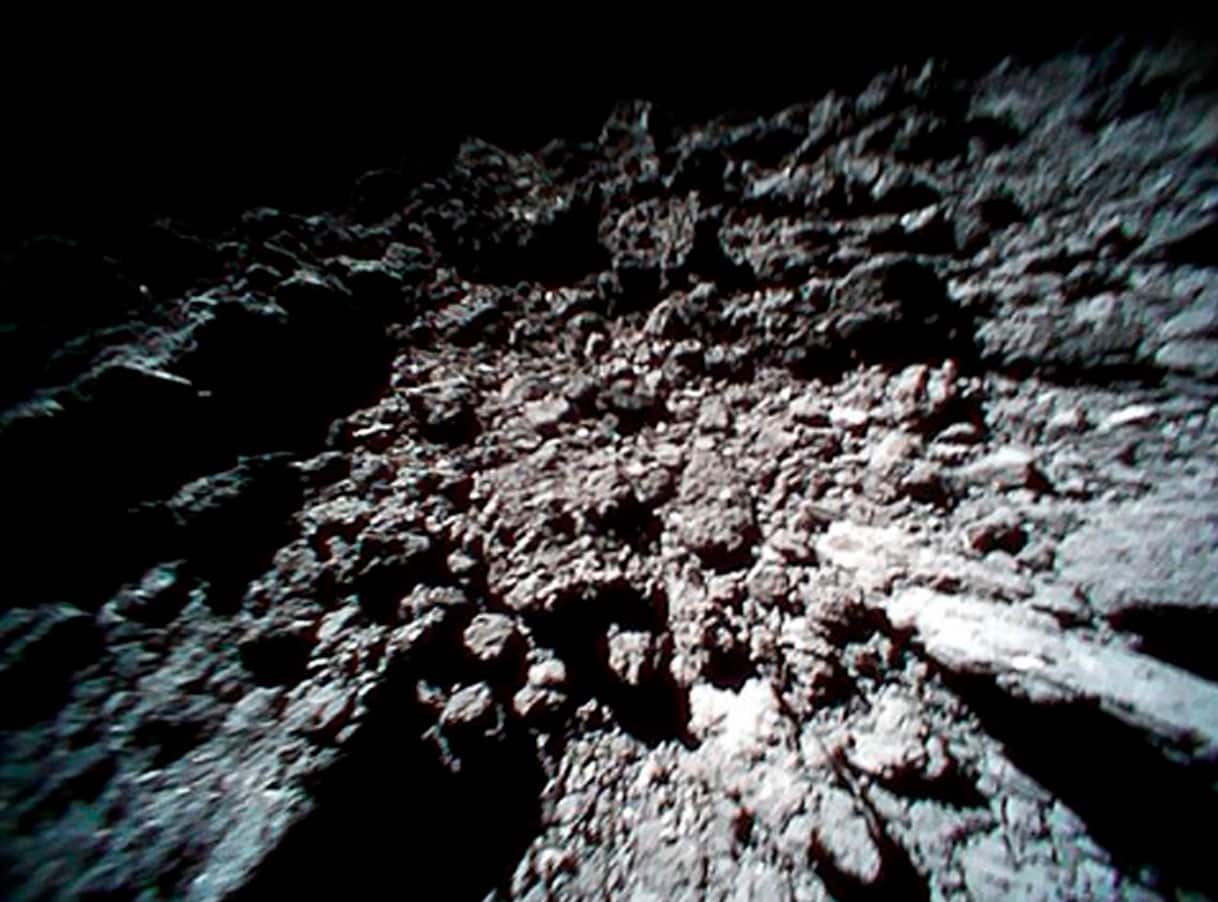 This Sept. 23, 2018 image captured by Rover-1B, and provided by the Japan Aerospace Exploration Agency (JAXA) shows the surface of asteroid Ryugu.