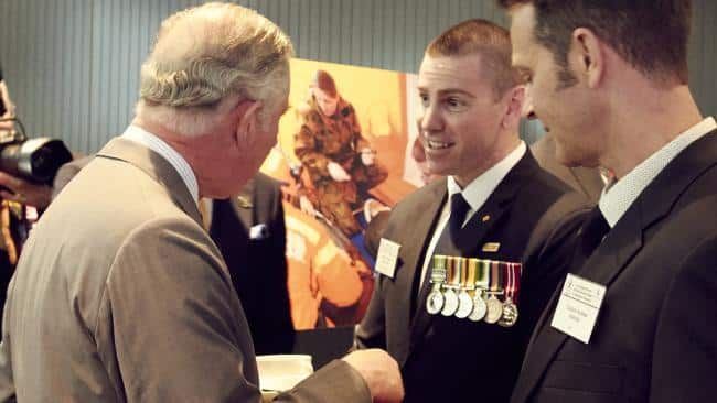 Jason meeting Price Charles. 