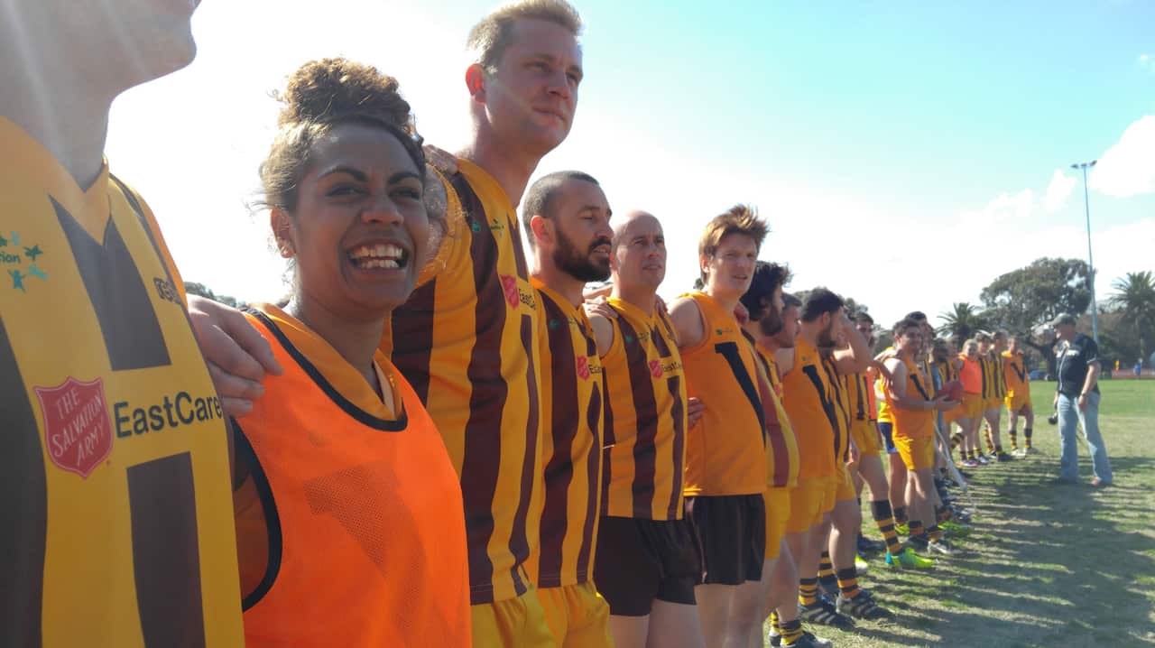 Kathleen Sailor stands with her Salvo Hawks teammates. Picture: Philip Ly