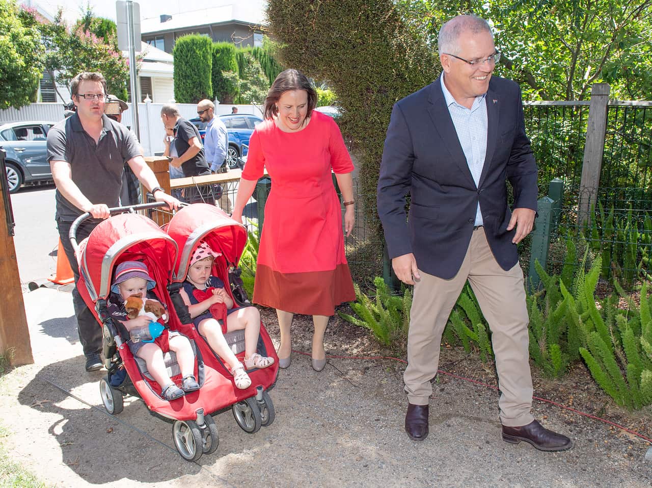 MP Kelly O'Dwyer, her family and Prime Minister Scott Morrison arrive to a joint press conference in Melbourne.