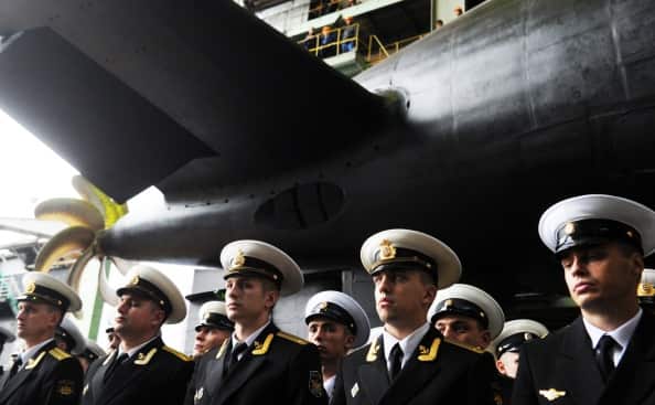 Russian navy officers attend the launching ceremony of the Russian diesel-electric attack submarine Stary Oskol.