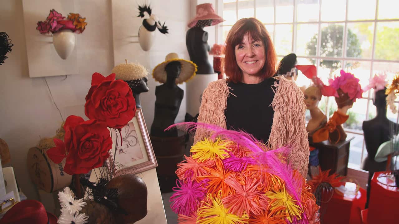 Kim Fletcher of Kim Fletcher Millinery Art in her studio 
