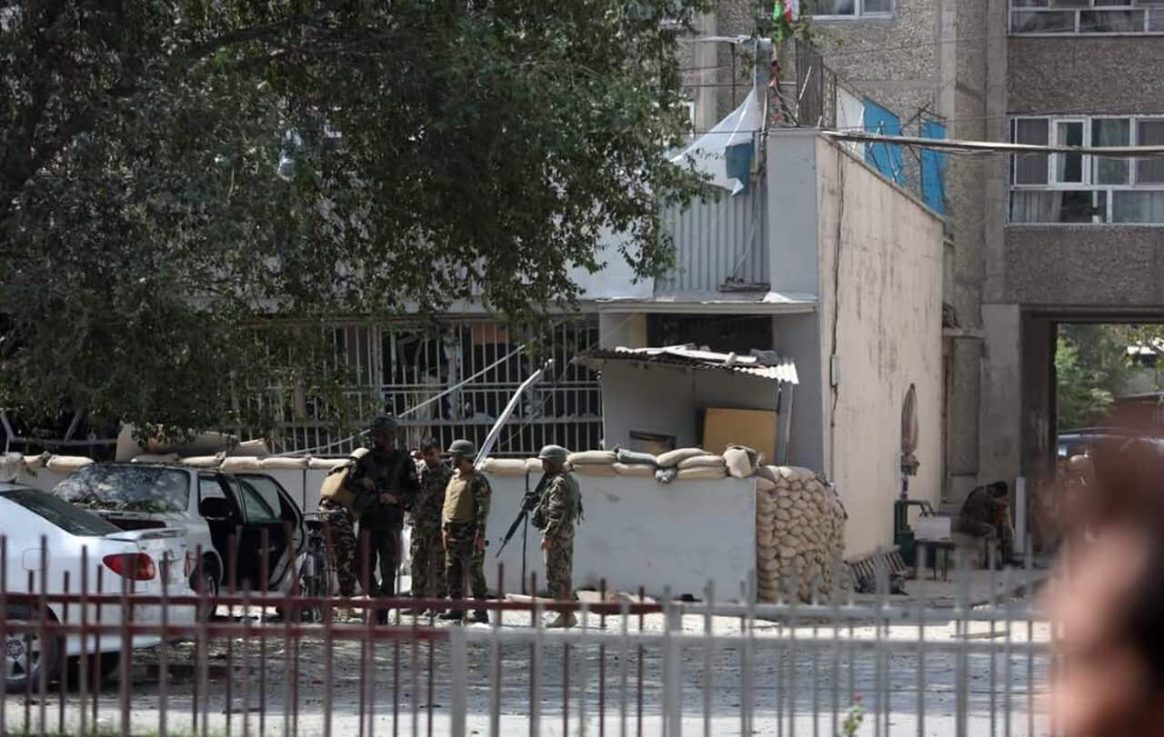 Afghan security personnel arrive at the site of an explosion near a bank in Kabul, Afghanistan, Tuesday, Aug. 29, 2017. 