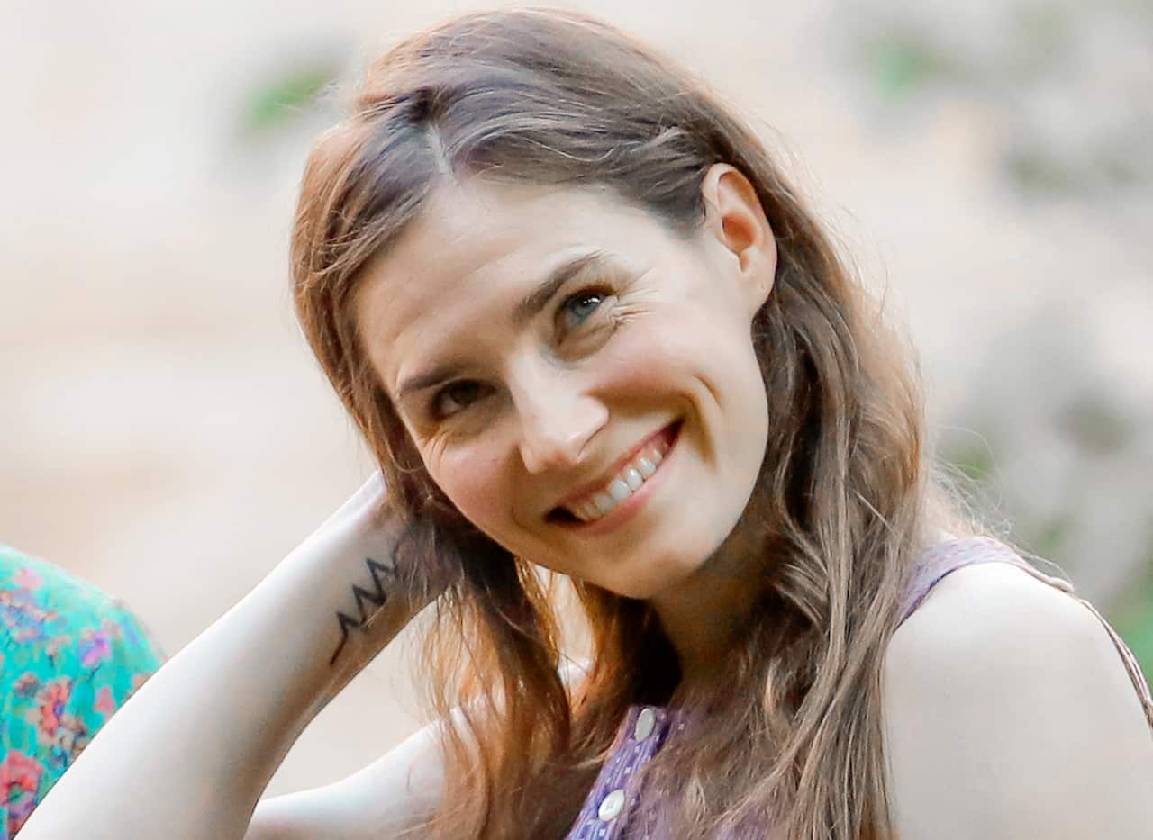 Amanda Knox attends a cocktail for the opening of the Innocence Project conference, in Modena, Italy.