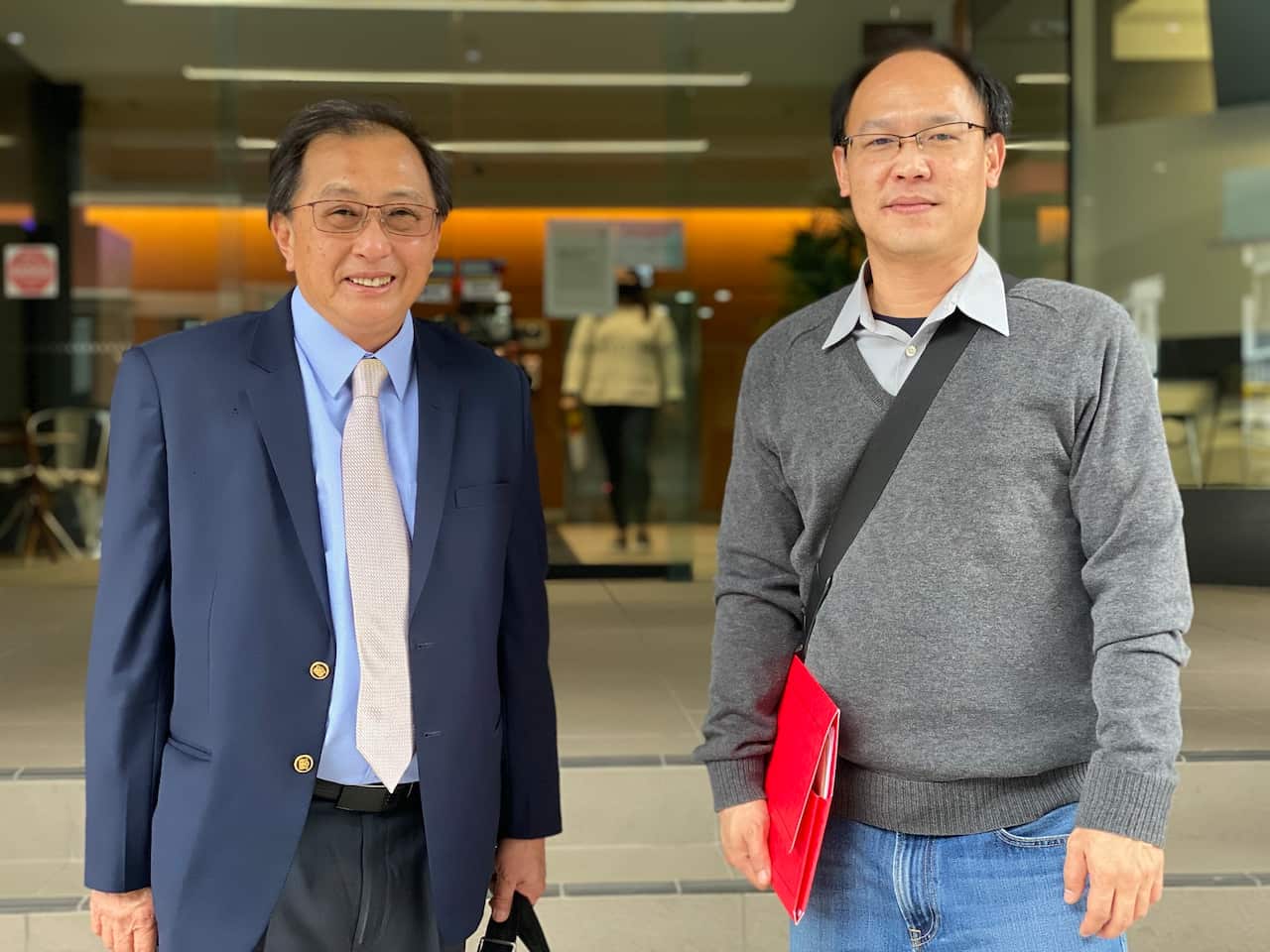 Troyrone Zen Lee, right, with his lawyer Michael Chan.