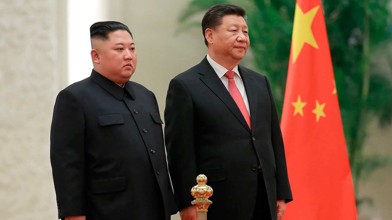 North Korean leader Kim Jong Un and Chinese President Xi Jinping attend a welcome ceremony at the Great Hall of the People in Beijing.