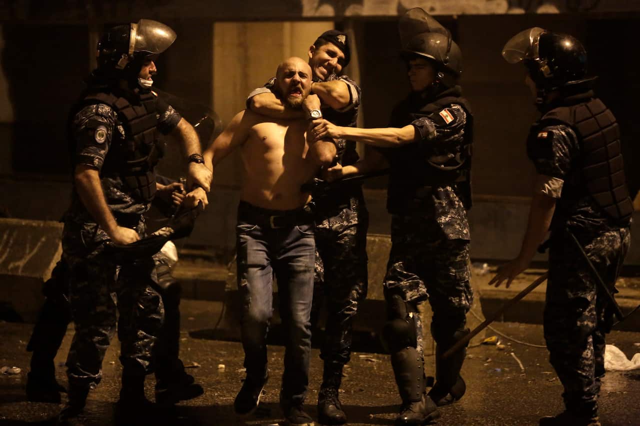 Demonstrators in Lebanon are blocking major roads across the country in a second day of protests against proposed new taxes.
