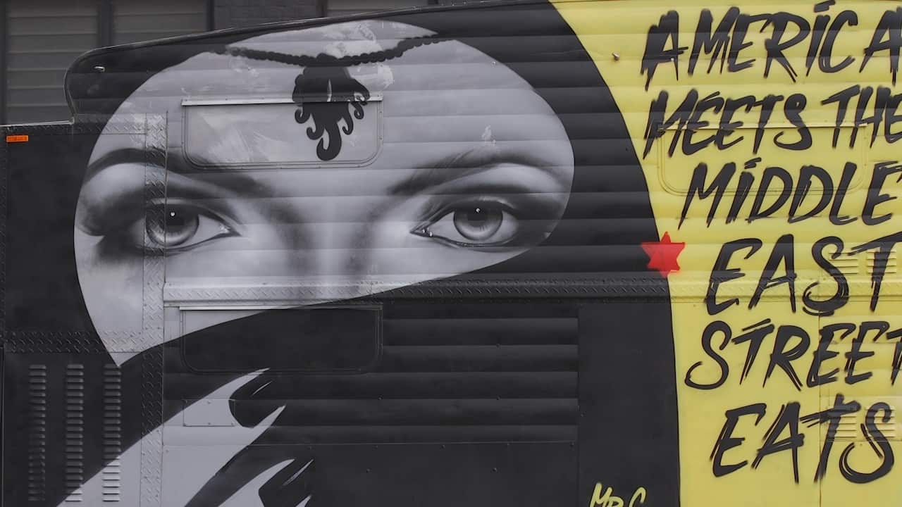 The belly dancer painted on the outside of Antoin's food truck.