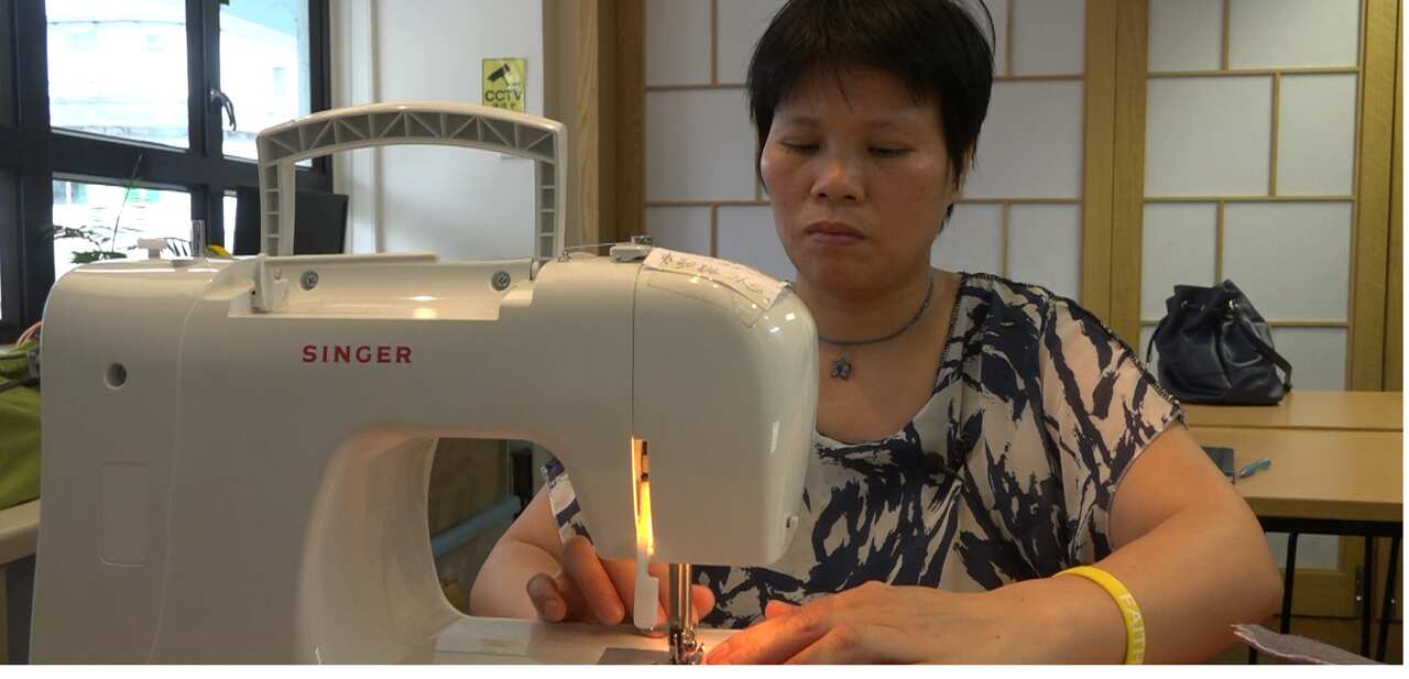 Siu Yu Kwan works as a seamstress, which allows her to provide money for her family and care for them at home.