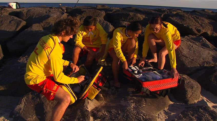 Thei-lay Paw and fellow life guards (SBS)