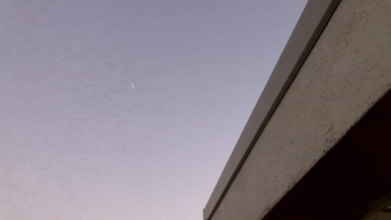 The bright ball of light seen in the distance.