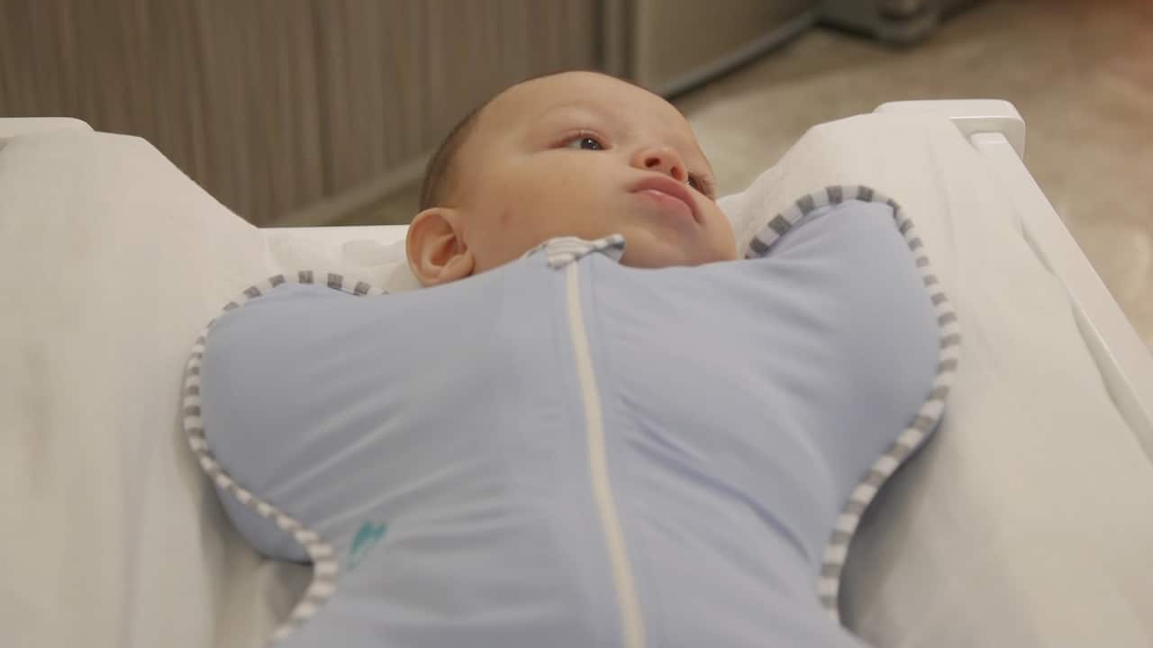 Love to Dream's swaddles are unique in that they allow the baby to sleep with their arms up.