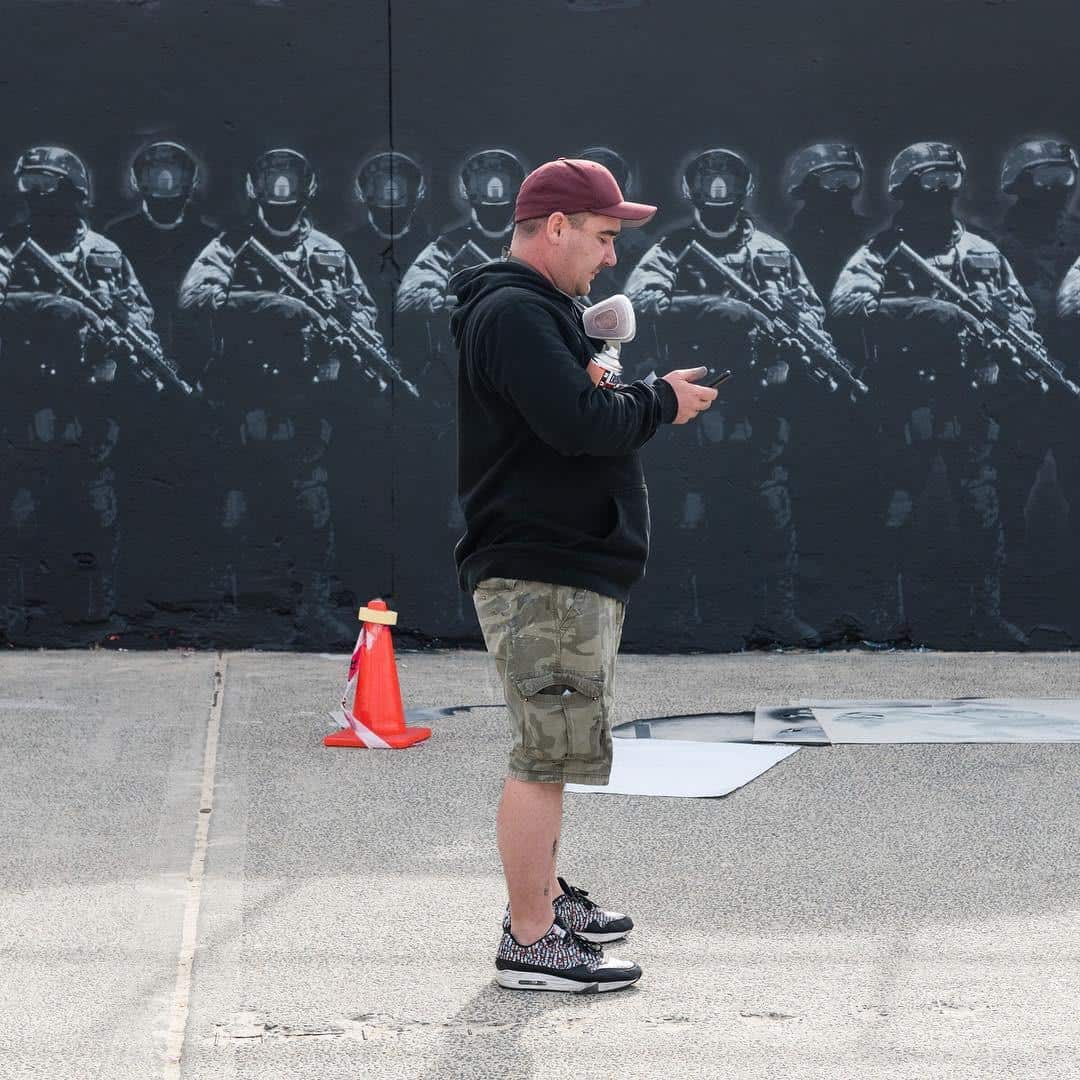 Luke Cornish says the mural is "a comment on our treatment of asylum seekers in Australian detention facilities".