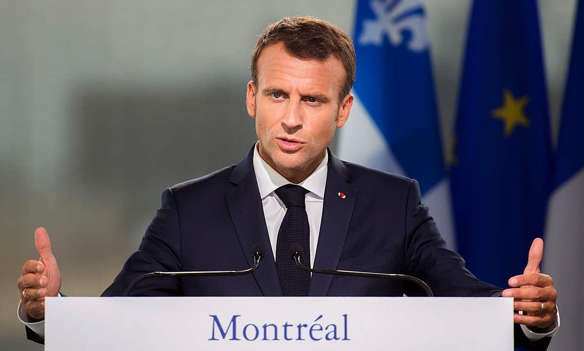 French President Emmanuel Macron speaks during a news conference in Montreal.