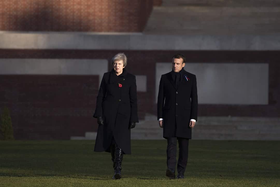 British Prime Minister Theresa May and French President Emmanuel Macron tour the Thiepval Memorial in France.