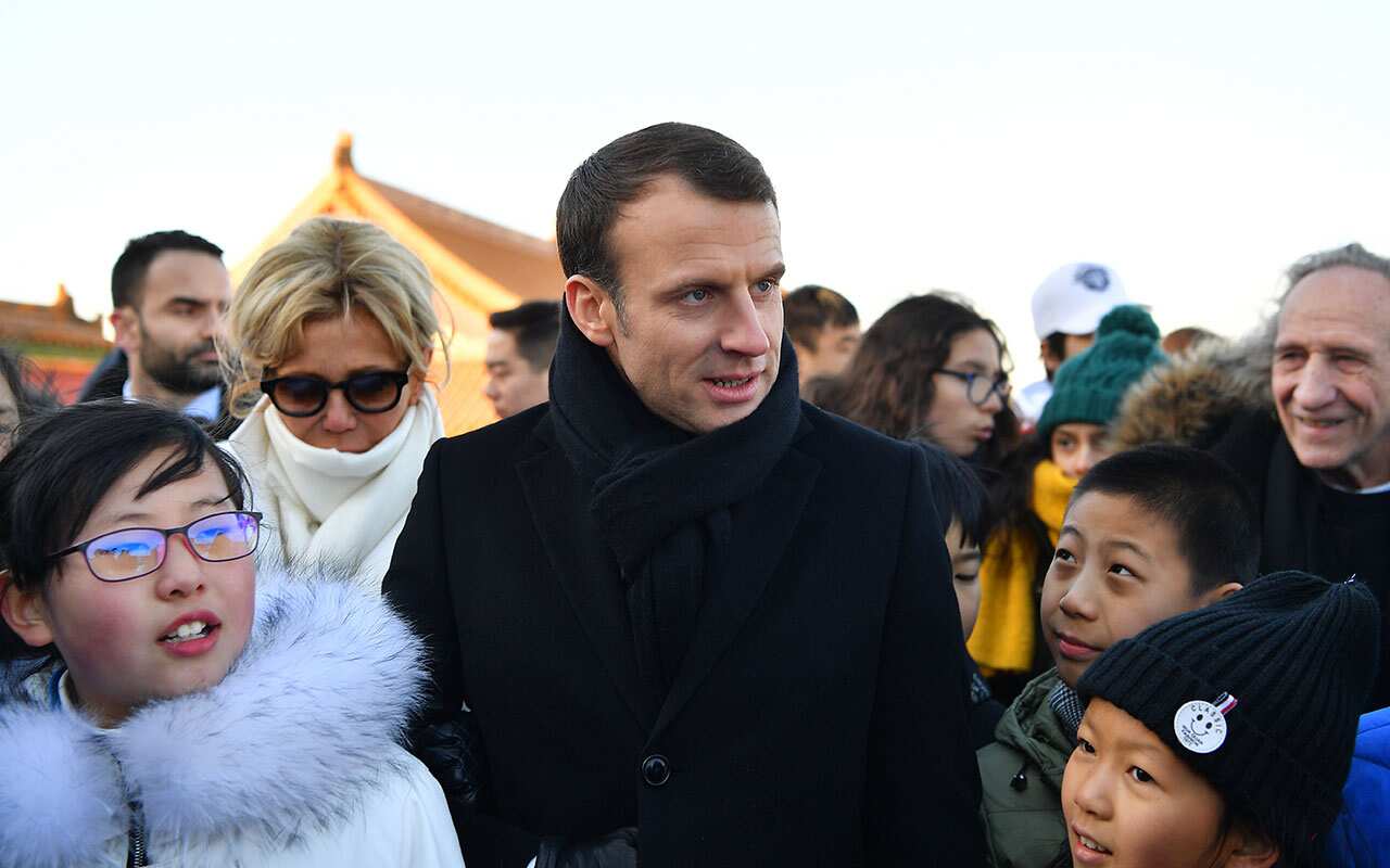 Macron toured Beijing's sprawling Forbidden City on Tuesday before a day of business deals and talks with his Chinese counterpart Xi Jinping