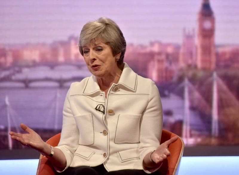 Prime Minister Theresa May has told the BBC the US president urged her to sue.