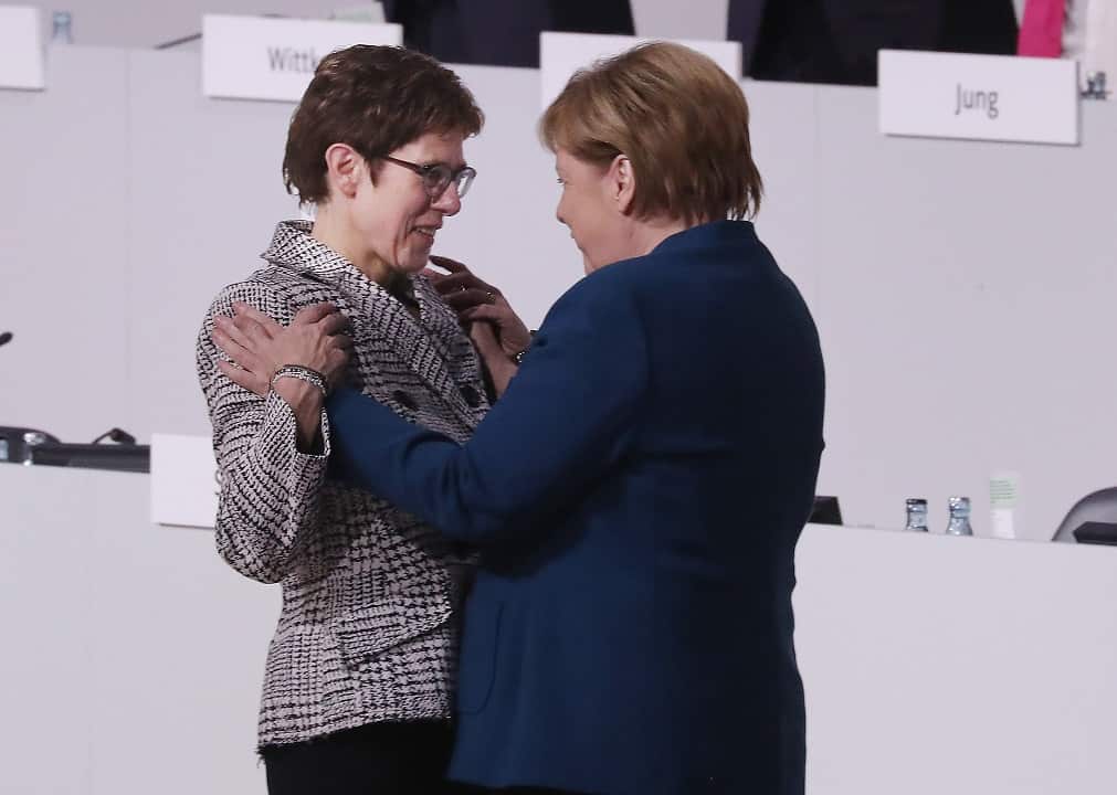 Annegret Kramp-Karrenbauer, left, is unfazed by her "mini-Merkel" nickname.