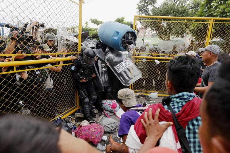 The caravan of migrants clash with the Guatemalan Police, in Tecun Uman, Guatemala.