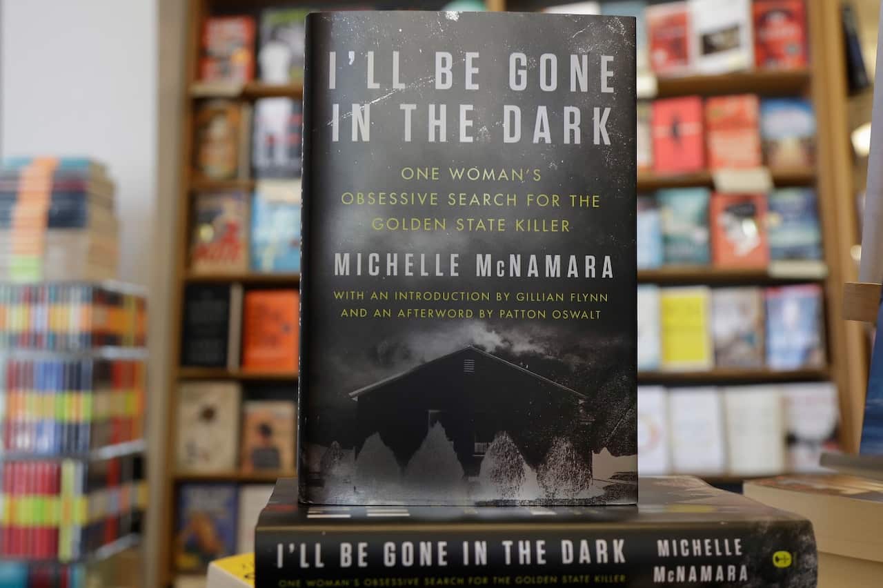 Copies of the books "I'll Be Gone in the Dark: One Woman's Obsessive Search for the Golden State Killer" by Michelle McNamara
