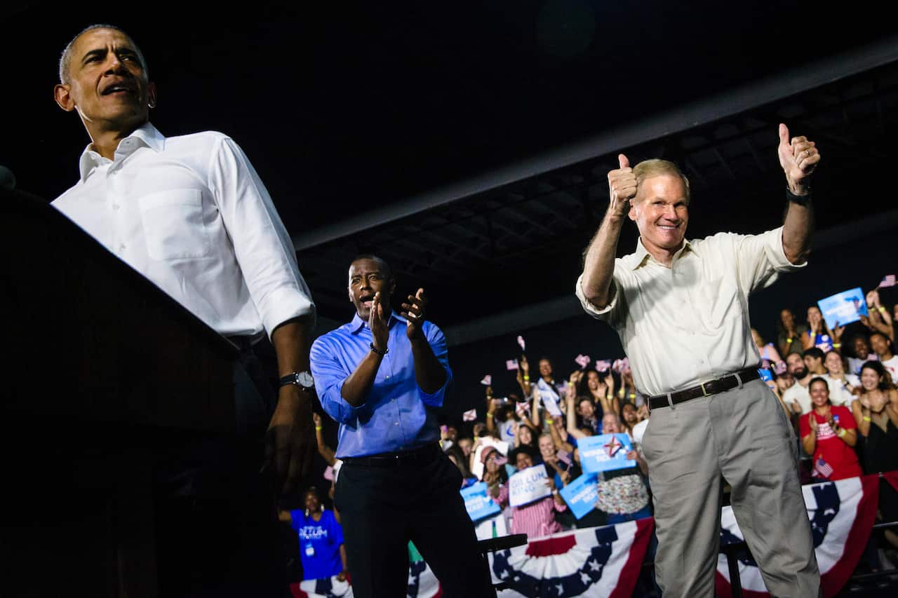 From left, former President Barack Obama stumps for Andrew Gillum, the Democratic gubernatorial candidate, and Sen. Bill Nelson (D-Fla.) at a rally in Miami on Friday, Nov. 2, 2018.