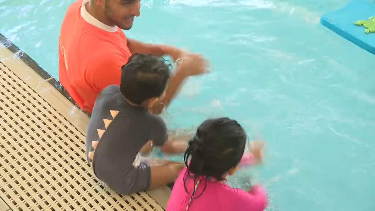 New arrivals can be reluctant to enroll themselves or their children in swimming class. 