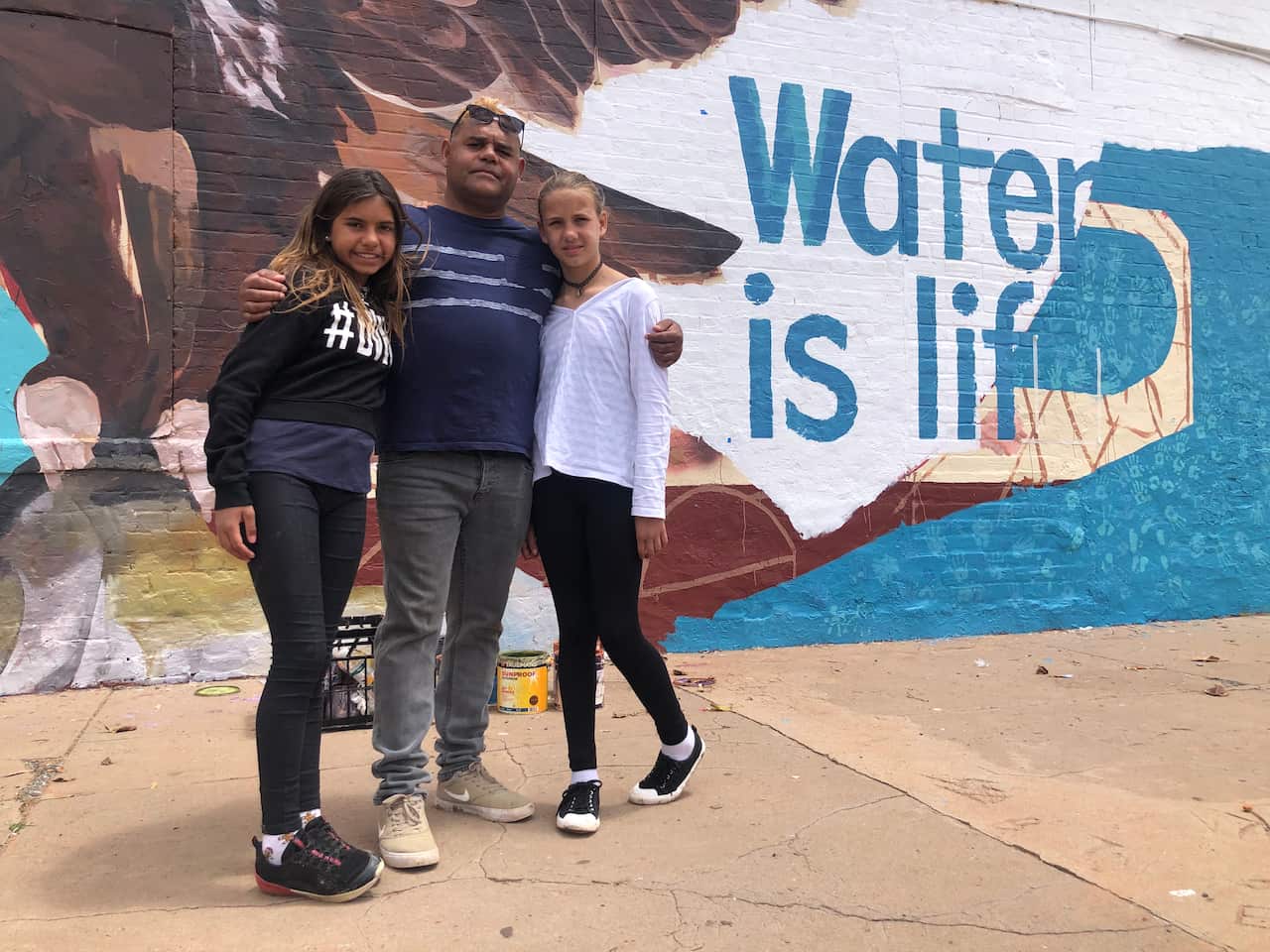 Owen Whyman with daughters Amelia (12) and Kathalka (11). 