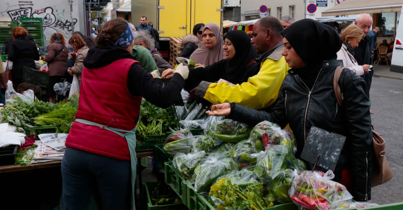 Muslims at a market in Favoriten, Vienna