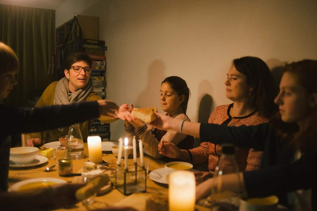 Pastors Jessa van der Vaart, second from right, and Rosaliene Israel, left, the secretary general of Protestant Church Amsterdam, during a meal in Amsterdam before going to Bethel Church at The Hague for a continuous service.