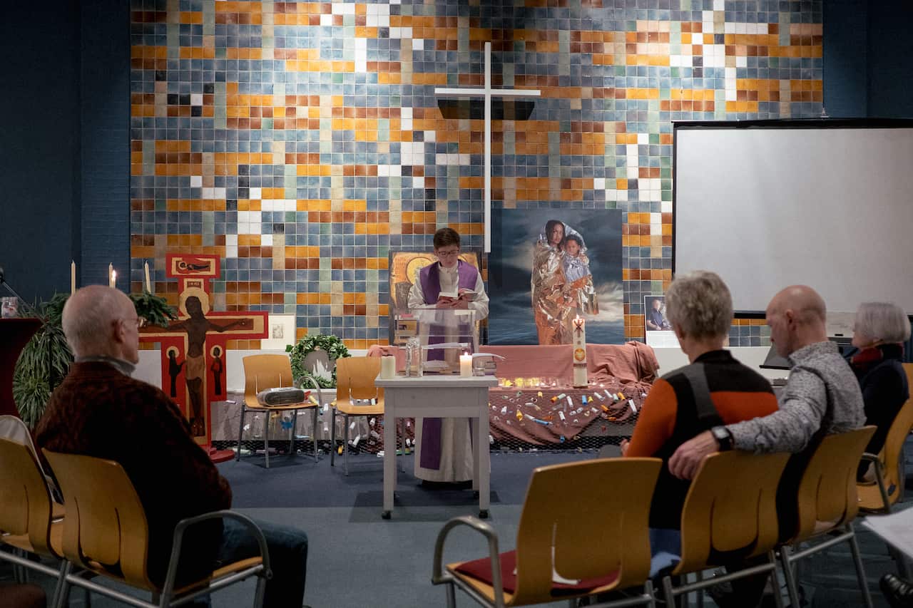 Pastor Rosaliene Israel, the secretary general of Protestant Church Amsterdam, presides over the continuous service at Bethel Church, in The Hague, Netherlands.